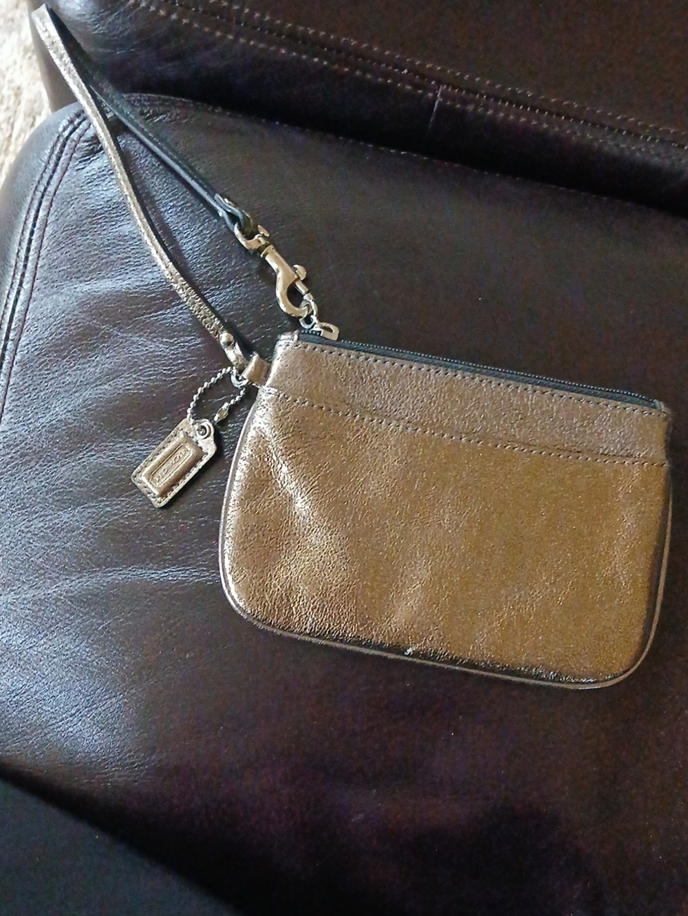 Coach Metallic Gold Wristlet Pouch with Logo Tag